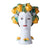 A scuptural bust from the neck up of a woman who's hair is made of lemons